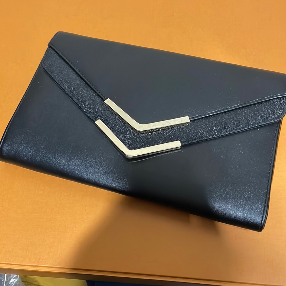 Aldo clutch in black and gold